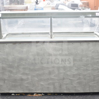 Carrier BRT68P commercial chest freezer with 3 ice cream tub collars, 115 volts, 1 phase; visible wear.