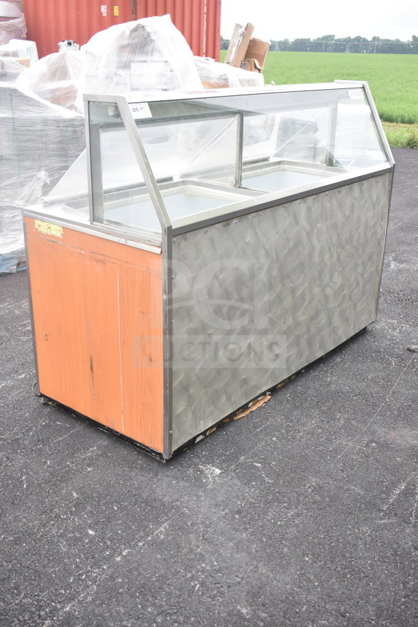 Carrier BRT68P commercial chest freezer with three ice cream tub collars, 115 volts, 1 phase, stainless steel finish.