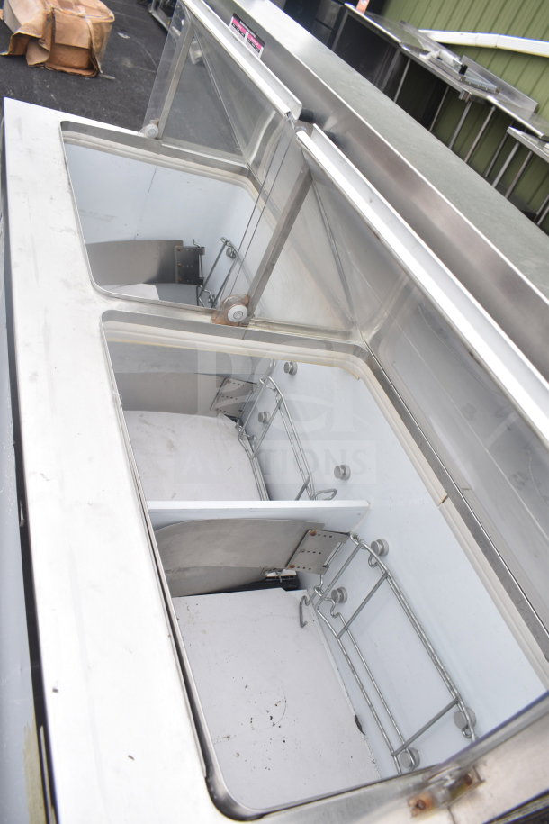 Carrier BRT68P commercial chest freezer, 115 volts, 1 phase, with 3 ice cream tub collars, stainless steel exterior.