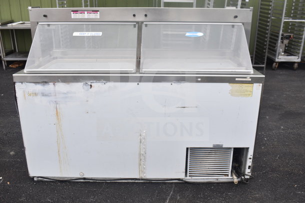 Carrier BRT68P commercial chest freezer with 3 ice cream tub collars, 115 volts, 1 phase. Visible wear and "Keep It Closed" label.