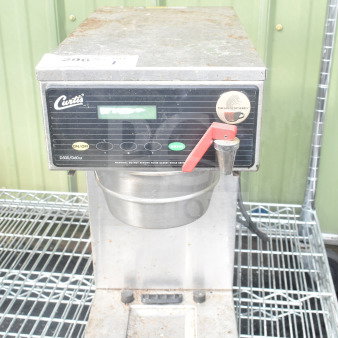 Curtis D60GT12A000 countertop coffee machine with hot water dispenser, visible wear, 115 volts, 1 phase.