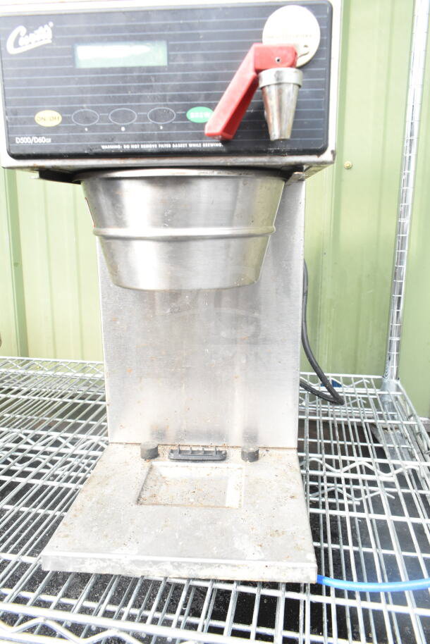 Curtis D60GT12A000 countertop coffee machine, hot water dispenser, 115V, visible wear, stainless steel exterior, red handle.