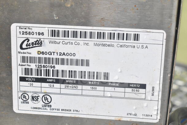 Curtis D60GT12A000 countertop coffee machine label showing model, 120V, 1-phase, 1500W, serial number 12580196.