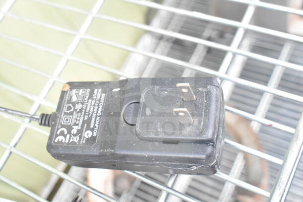 Power adapter for Safescan TA-8025 Fingerprint Clock In System, black, labeled with model details, used condition.
