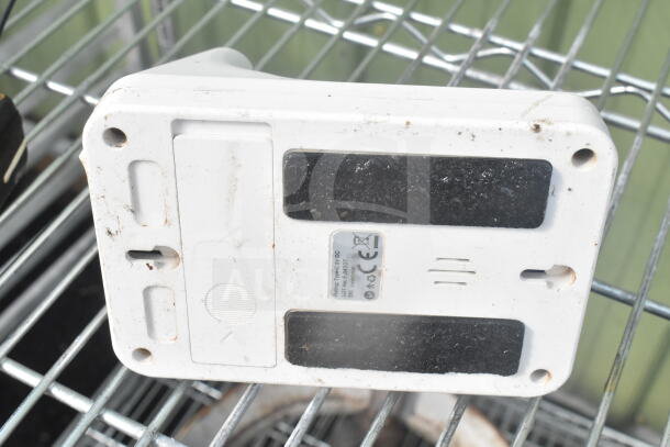 Safescan TA-8025 Fingerprint Clock In System, white, moderate wear, model label with CE marking, visible dirt and scratches.