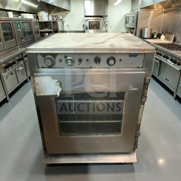 Alto-Shaam CH-75/DM stackable cook & hold oven, electric, well-maintained, operational, visible wear on surface, kitchen setting.