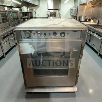 Alto-Shaam CH-75/DM stackable cook & hold oven, electric, well-maintained, operational, visible wear on surface, kitchen setting.
