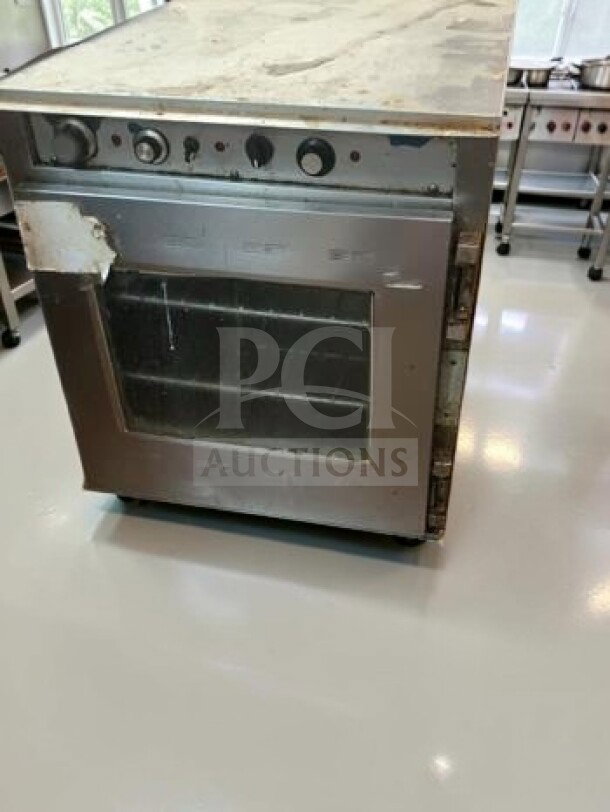 Alto-Shaam CH-75/DM stackable cook & hold oven, well-maintained, electric, with control knobs, glass door, fully operational.