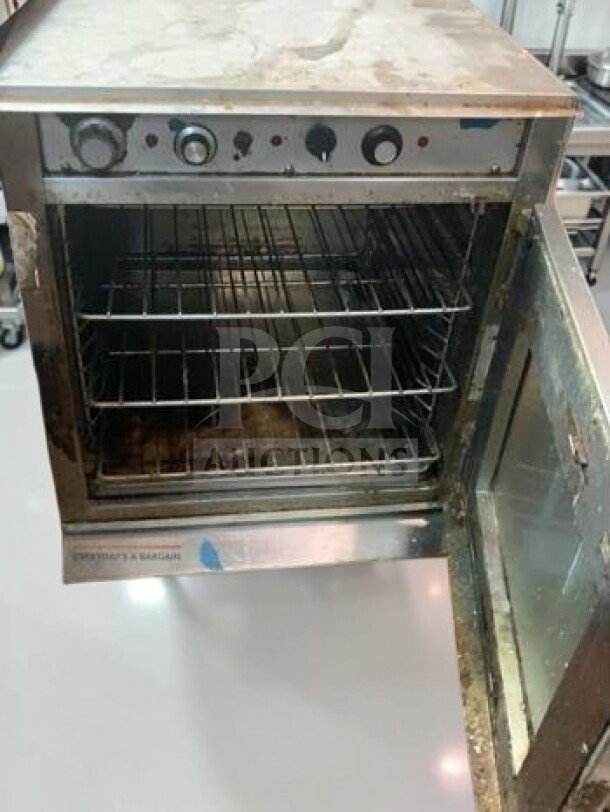 Alto-Shaam CH-75/DM stackable cook & hold oven, electric, with control dials, open door, well-maintained condition.