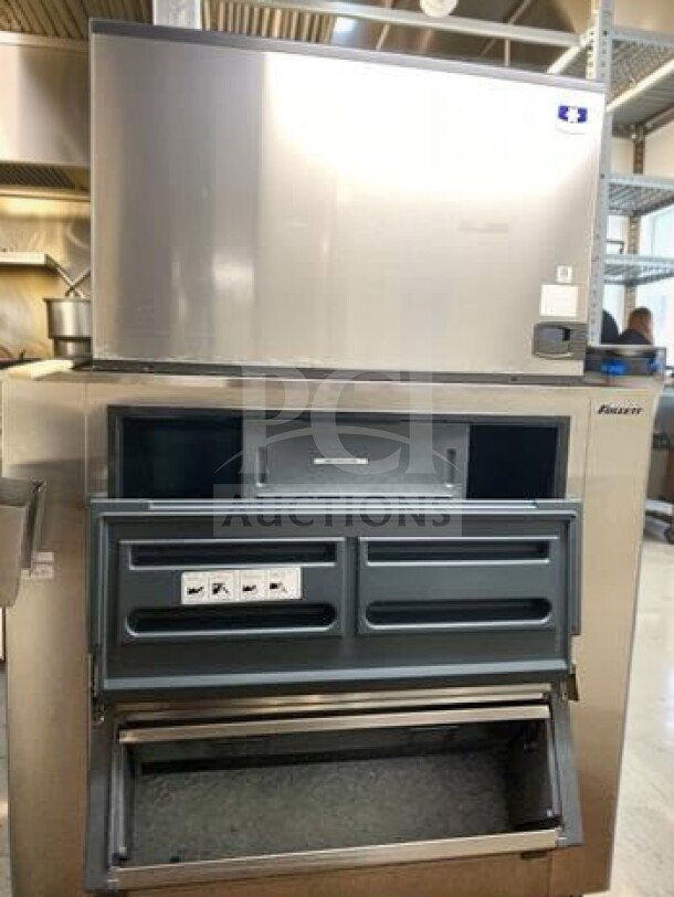 Follett Sentry Series ice storage bin with pull-out dispenser, Manitowoc ice machine, 1500 lb/day output, superior condition.