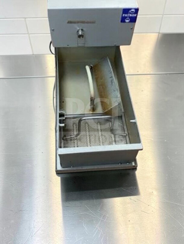 FIL-TROX FFS-Series Mobile Fryer Oil Filtration System, premium condition, fully tested, and operational, shown on metal surface.