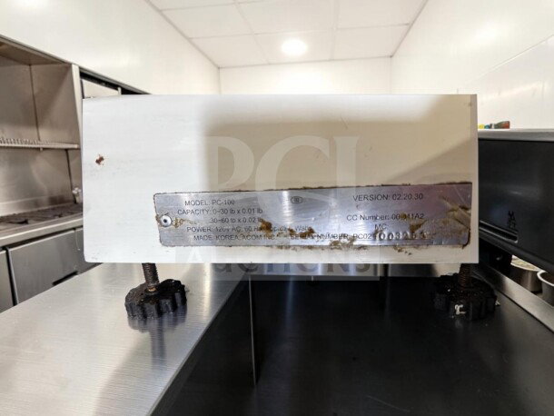 Skyfood PC-100-PL price computing scale, 60 lb capacity, stainless steel, pole display, fully tested, model details visible.