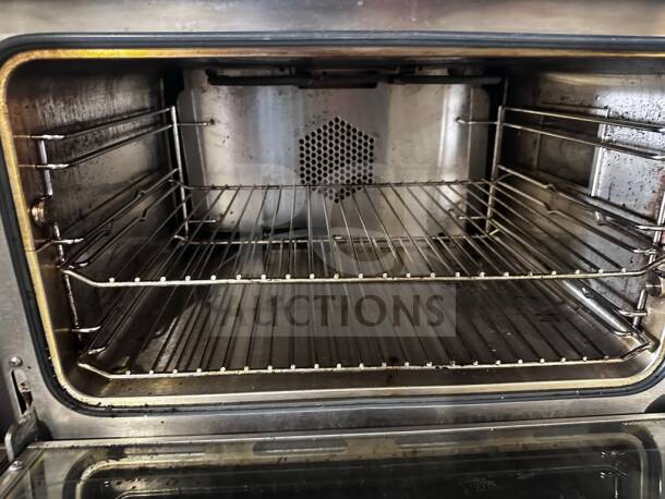 Star Holman CCOH-3 electric convection oven, half-size, prime condition, stainless steel interior, dual racks, 120V, 1440W.