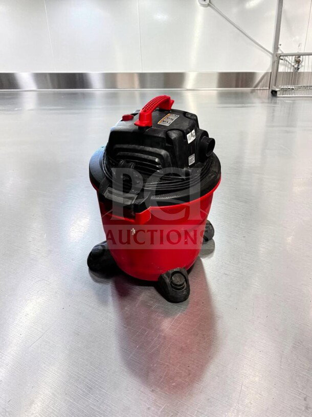 Craftsman CMXEVBE17595 16 Gallon 6.5 HP Wet/Dry Shop Vacuum in excellent condition, red and black, on wheels.