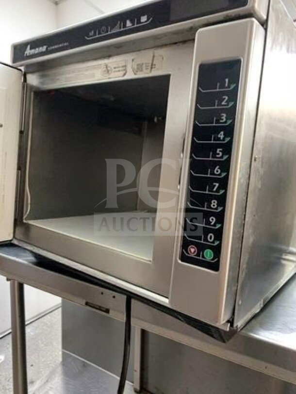Amana RC17S2 heavy-duty commercial microwave, stainless steel, 1700W, 208/240V, ETL listed, fully operational, keypad controls.