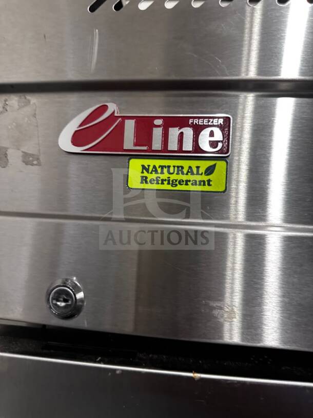 Turbo Air EF24-1-N-V Freezer, E-Line, natural refrigerant label, stainless steel finish, excellent condition.