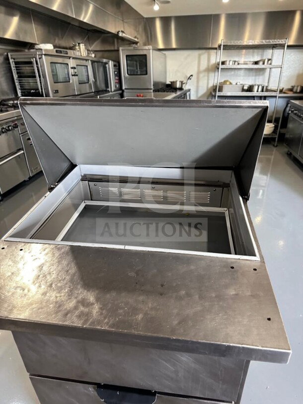 Beverage-Air SPED27HC-12M-B, 27" mega top refrigerated prep unit. Immaculate condition, NSF & UL listed, 6.8 Cu. Ft., 115V.