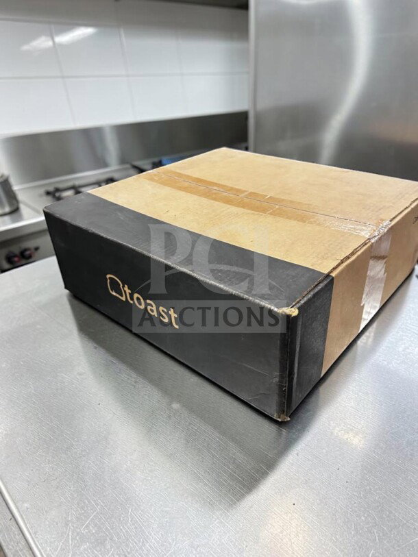 Brand new Toast Cash Drawer in black, model TOA-S-CASH-1239, 16" size, sealed in original box.