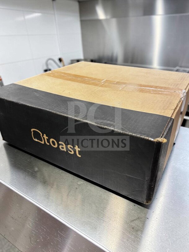 Brand new Toast Cash Drawer in original box. Black, 16" commercial POS register drawer, model TOA-S-CASH-1239.