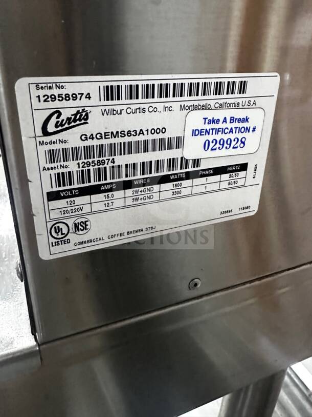 Wilbur Curtis G4GEMS63A1000 Gemini stainless steel coffee brewer, 1.5 gallon, NSF & UL listed, serial 12958974, tags visible.