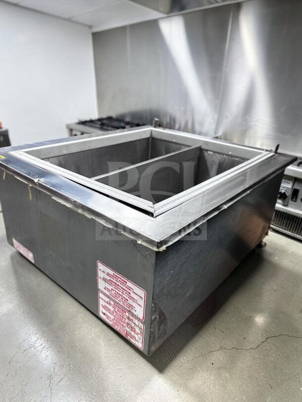 Silver King SKFDI23-ELUS1 drop-in ice cream dipping freezer, 22.5", two-section, excellent condition, ETL listed.