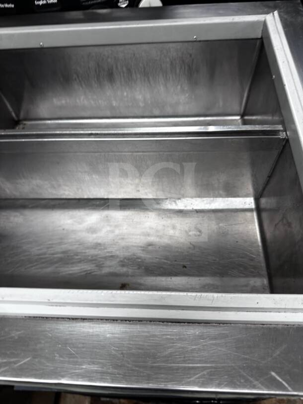 Silver King SKFDI23-ELUS1 drop-in ice cream dipping freezer, 22.5", 2-section, silver, excellent condition, ETL listed.