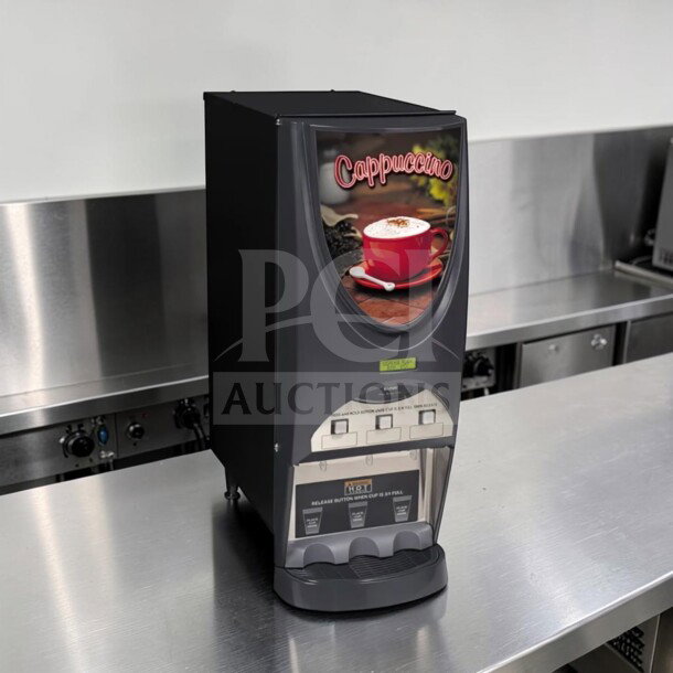 Bunn iMIX-3S+ 3-hopper beverage dispenser, model 38600.0300, in first-class condition on stainless steel counter.