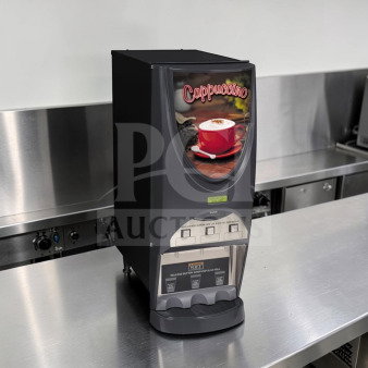 Bunn iMIX-3S+ 3-hopper beverage dispenser, model 38600.0300, in first-class condition on stainless steel counter.
