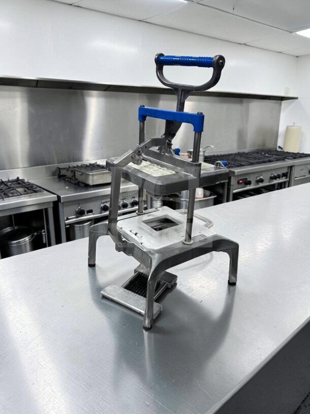 Prince Castle 980-000-00 Saber King manual slicer in optimal condition, stainless steel, NSF certified, commercial use ready.