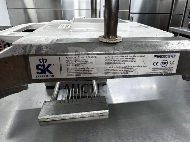 Prince Castle 980-000-00 Saber King manual slicer, optimal condition, NSF certified, stainless steel, safety labels visible.