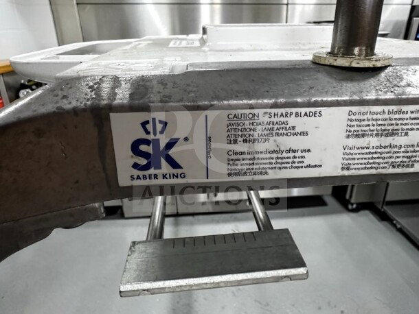 Prince Castle 980-000-00 Saber King food slicer, optimal condition, NSF certified, caution label for sharp blades visible.