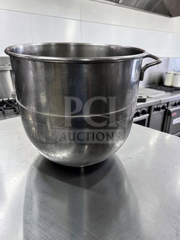 Hobart 30 Qt. stainless steel mixer bowl, high-grade condition, heavy-duty commercial use, handles visible, shiny finish.
