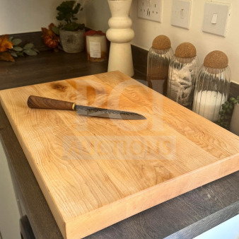 Large maple butcher block cutting board, approx. 24"x18", non-slip feet, excellent condition, suitable for chef or restaurant use.