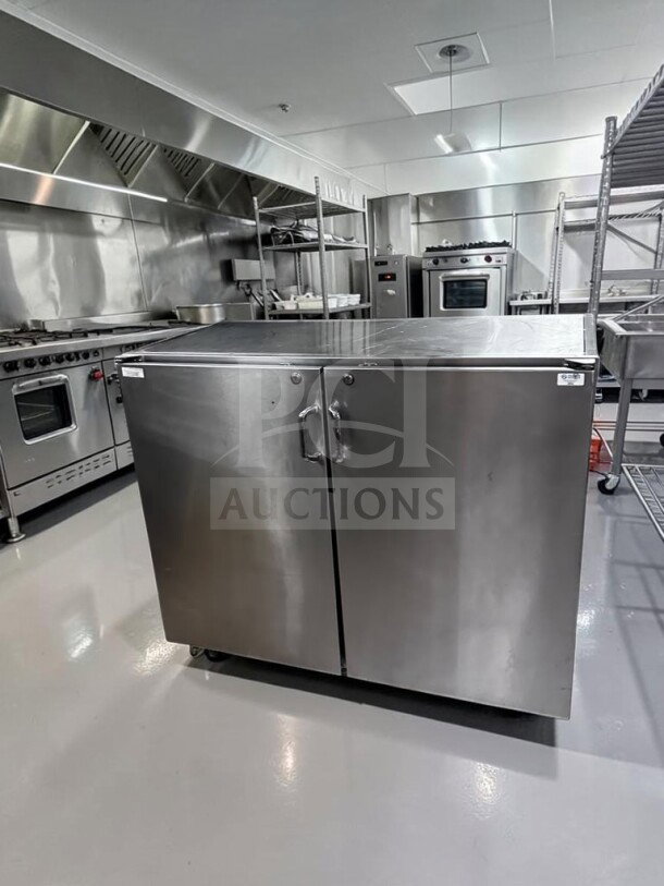Commercial stainless steel storage cabinet, 48" wide, dual locking swing doors, heavy-duty worktop, fully inspected, unbranded.