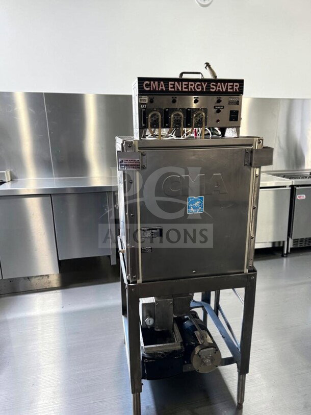 CMA EST-AH2 Energy Mizer commercial dishwasher in excellent condition, handles 40 racks/hour, tested and operational.