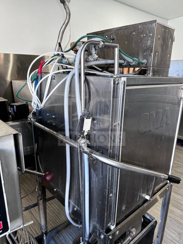 CMA Dishmachines EST-AH2 Energy Mizer® commercial dishwasher in exceptional condition, capable of 40 racks/hour, 115V, fully operational.