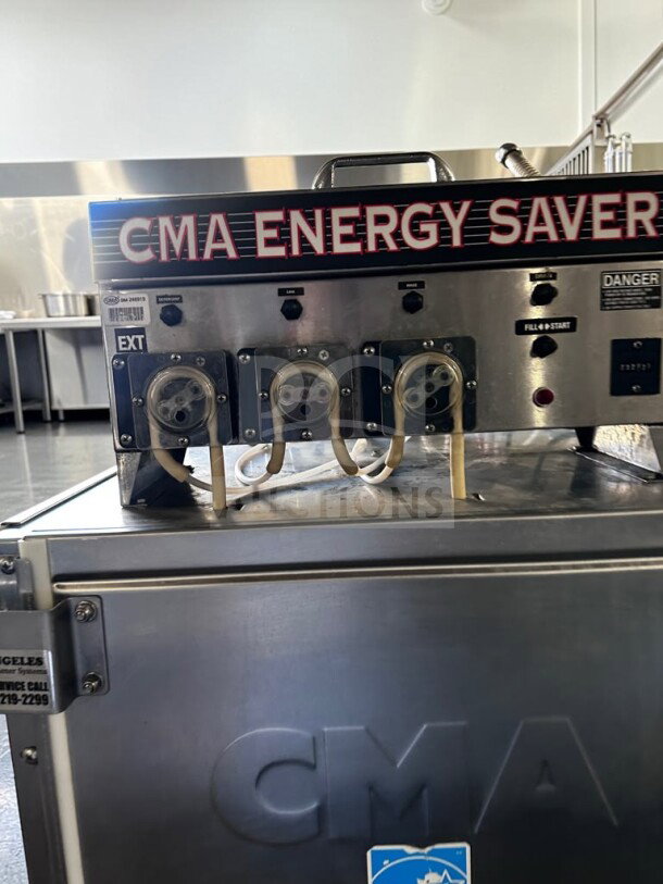 CMA EST-AH2 Energy Mizer commercial dishwasher in exceptional condition. Visible controls and CMA branding.