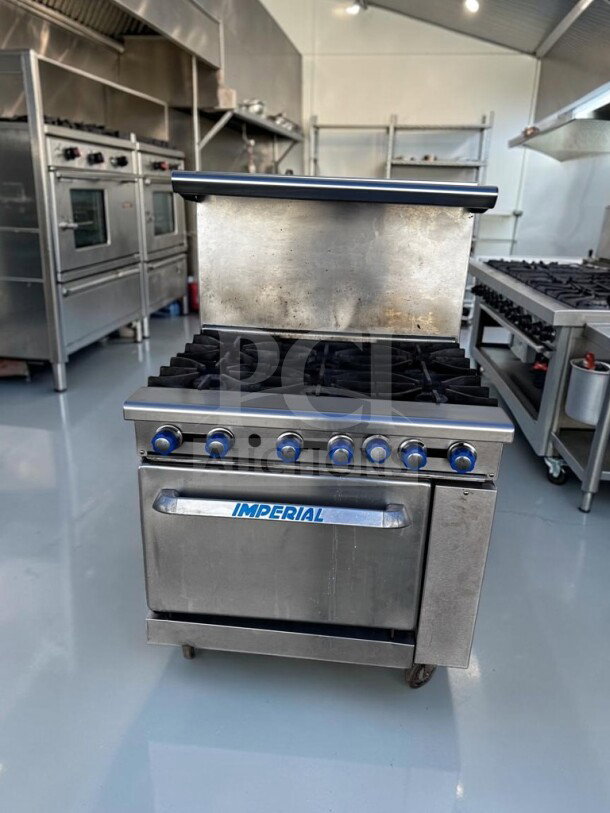 Imperial IR-6 Pro Series 36" commercial 6-burner gas range with oven, 227,000 BTU, natural gas, NSF & CSA certified, excellent condition.