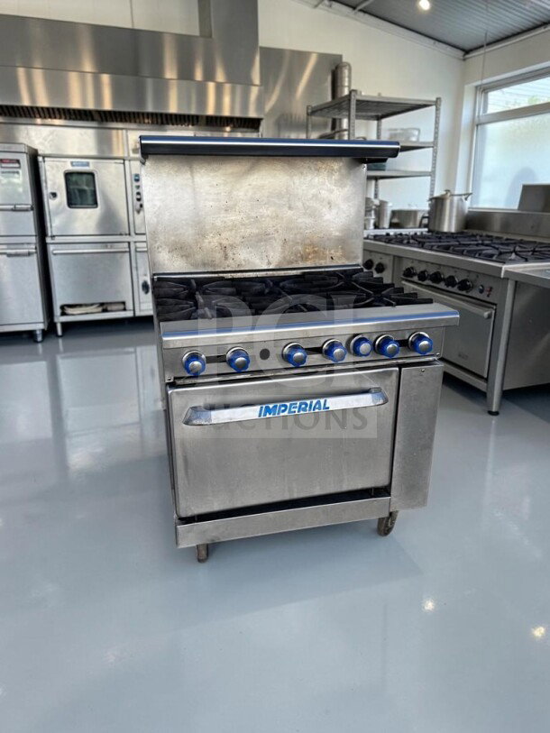 Imperial IR-6 Pro Series 36" 6-burner gas range with oven; 227,000 BTU, NSF/CSA certified, in superior condition.
