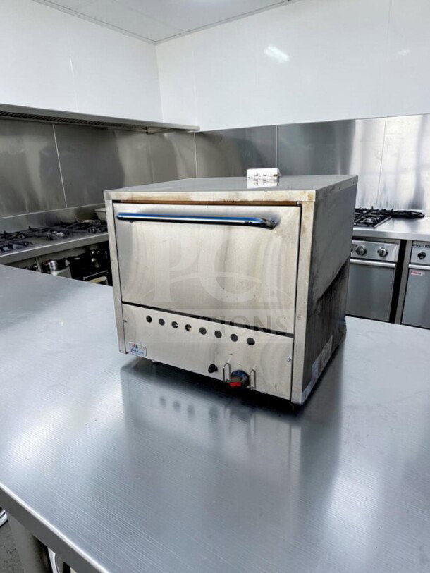 Outstanding condition Cooler Depot PO31 pizza deck oven, 36", dual hearth, 25,000 BTU, NSF certified, fully tested.