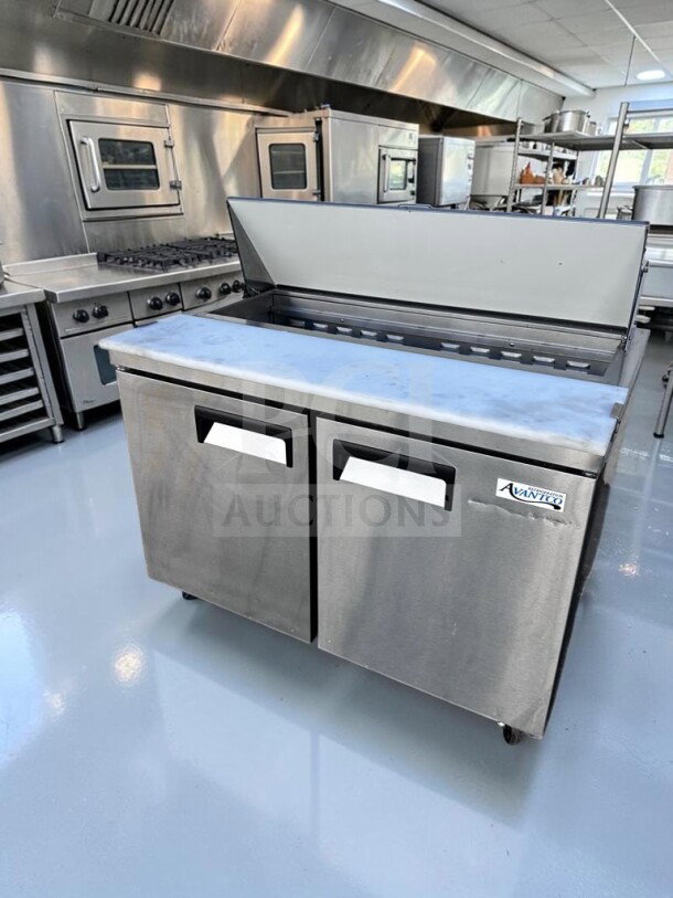 Avantco APT-48-HC refrigerated prep table, 47", dual-door, holds 12 pans, excellent condition, ETL & NSF certified.