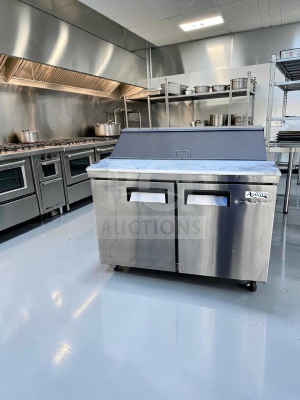 Avantco APT-48-HC refrigerated prep table, 47", two-door, 12-pan capacity, ETL & NSF certified, excellent condition.