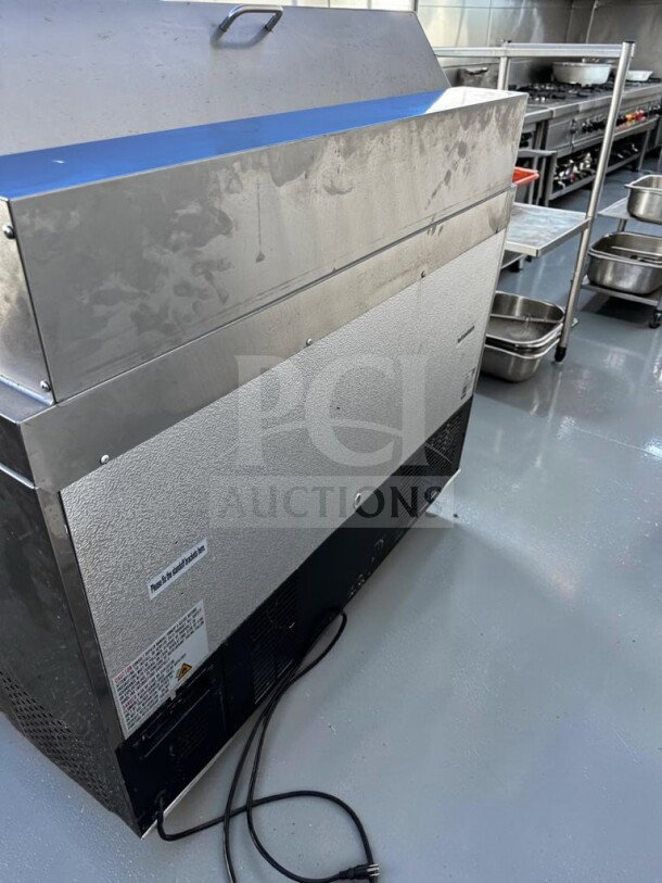 Avantco APT-48-HC refrigerated sandwich prep table, 47", two doors, 12-pan capacity, elite condition, ETL & NSF certified.