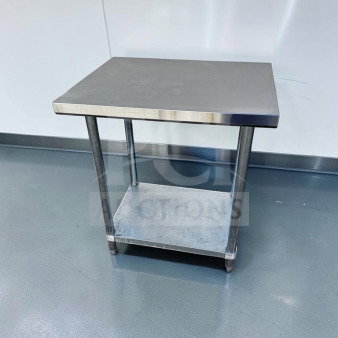 Commercial stainless steel work table, 32" × 24", with adjustable undershelf and casters. First-class condition, fully inspected.