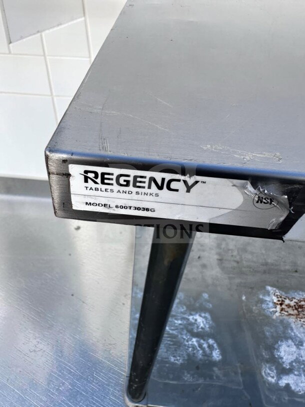 Regency 600T3036G stainless steel work table, 36"x30", galvanized undershelf, adjustable feet, NSF certified, commercial use.