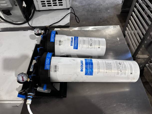 Ecolab KineticoPRO KPMF HC614-2 water filtration system with dual cartridges, pressure gauges, NSF/ANSI 42 certified, excellent condition.