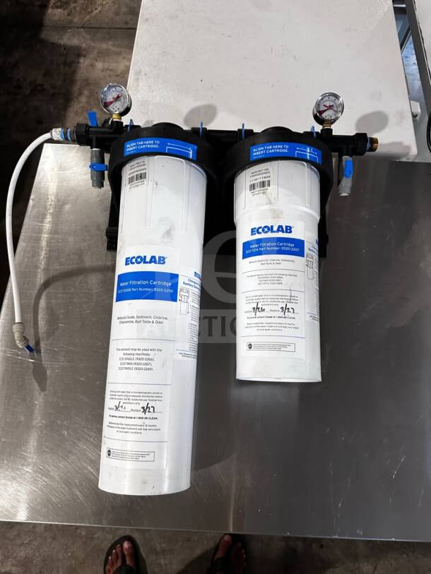 Ecolab KineticoPRO KPMF HC614-2 dual-cartridge water filtration system, 150,000-gallon capacity, dual pressure gauges, NSF/ANSI 42 certified, excellent condition.