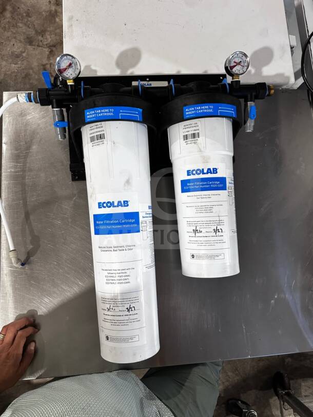 Ecolab/KineticoPRO KPMF HC614-2 dual-cartridge water filtration system with pressure gauges; NSF/ANSI 42 certified, 150,000-gal capacity.