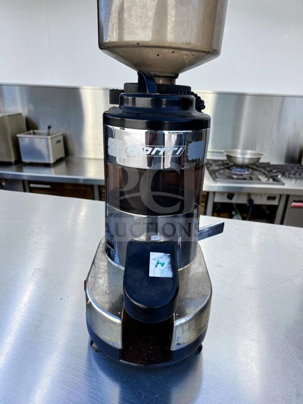 Professionally maintained Gino Rossi RR45 espresso grinder, Italy, 64mm flat burrs, fully operational, metal body, visible G. Rossi logo.