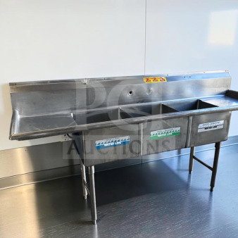 Flawless commercial stainless steel sink with three compartments, dual drainboards, high backsplash, and adjustable legs.